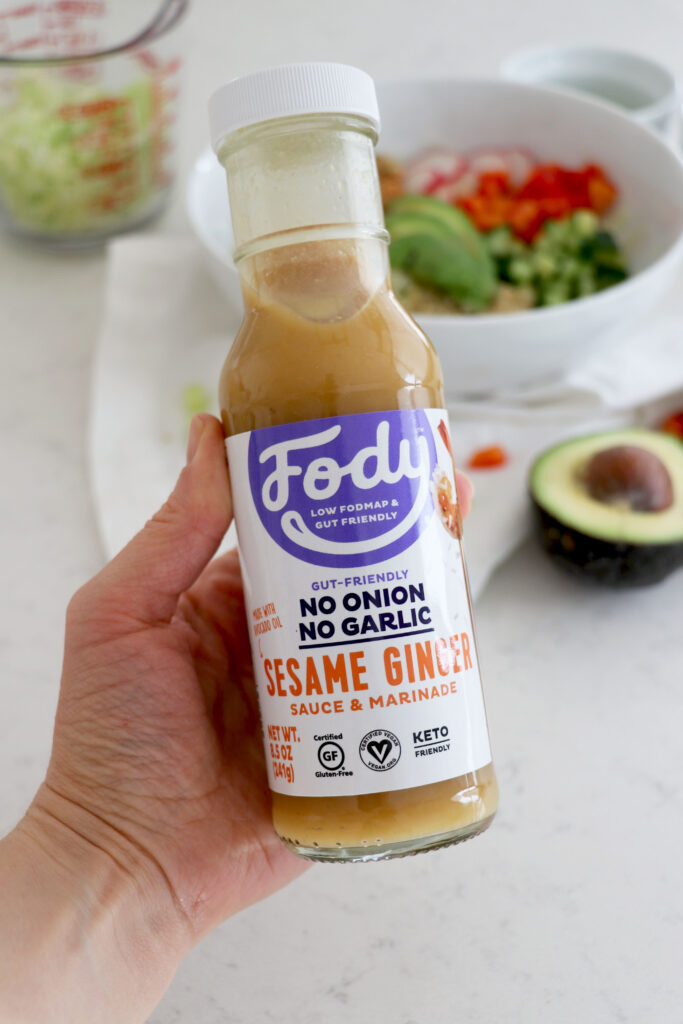 Hand holding Fody dressing.