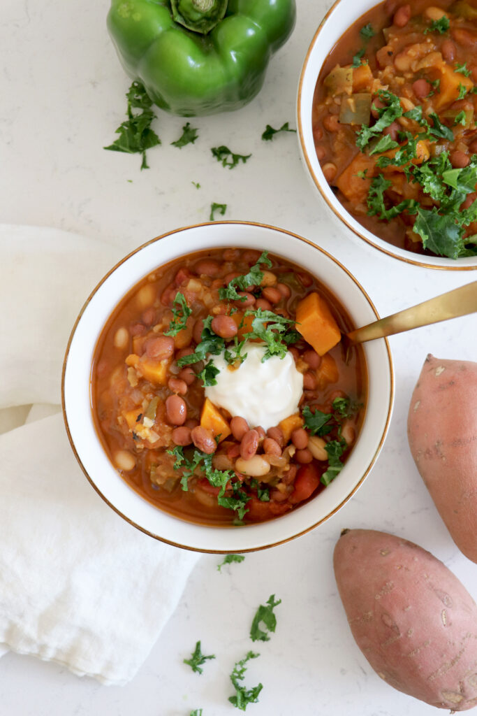 Two bowls of sweet potato and bean chili.