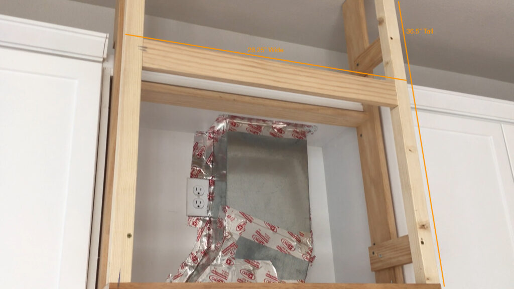 Wood framing attached to kitchen cabinetry with dimensions 28.25 inches wide by 36.5 inches tall