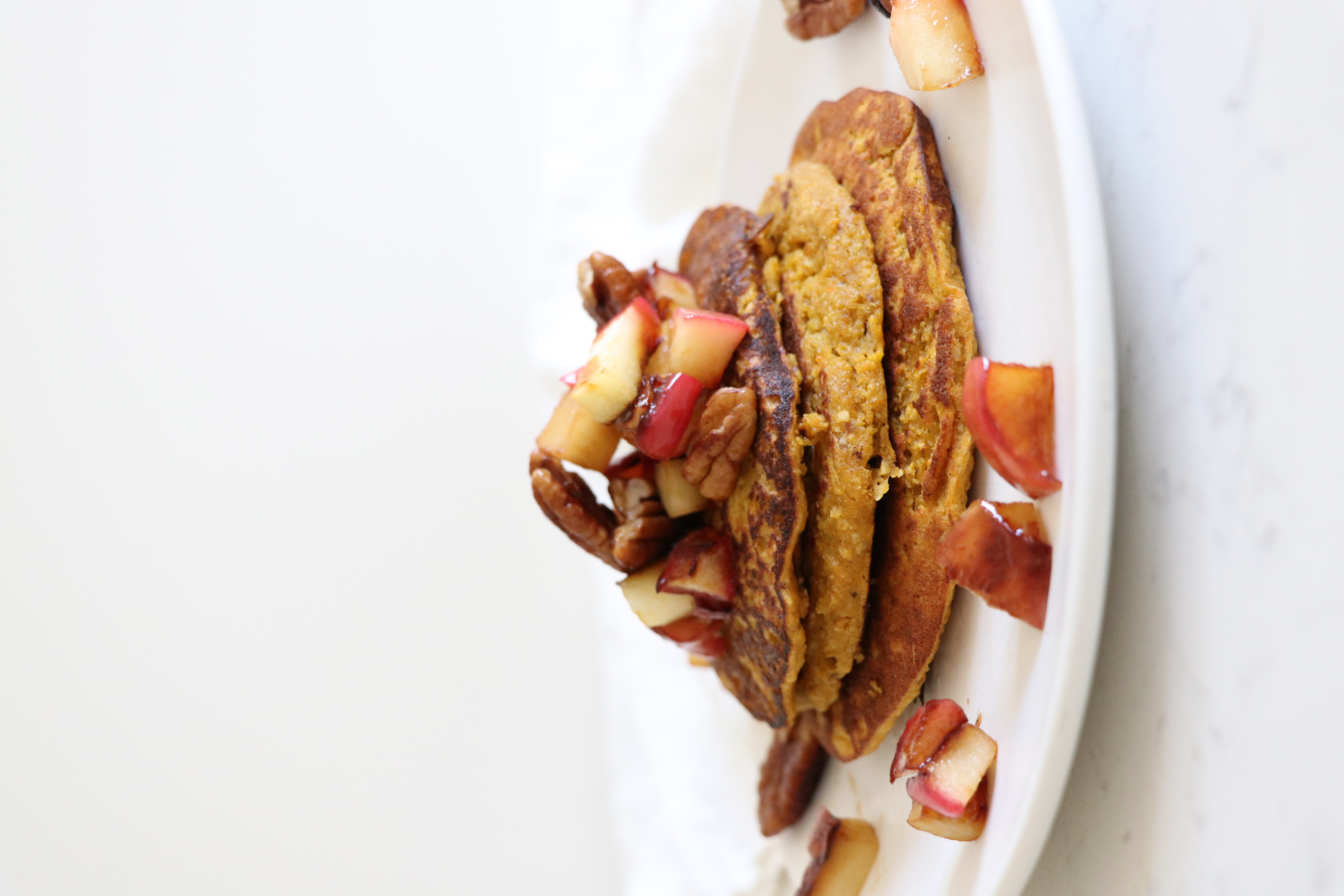 Pancakes on white plate