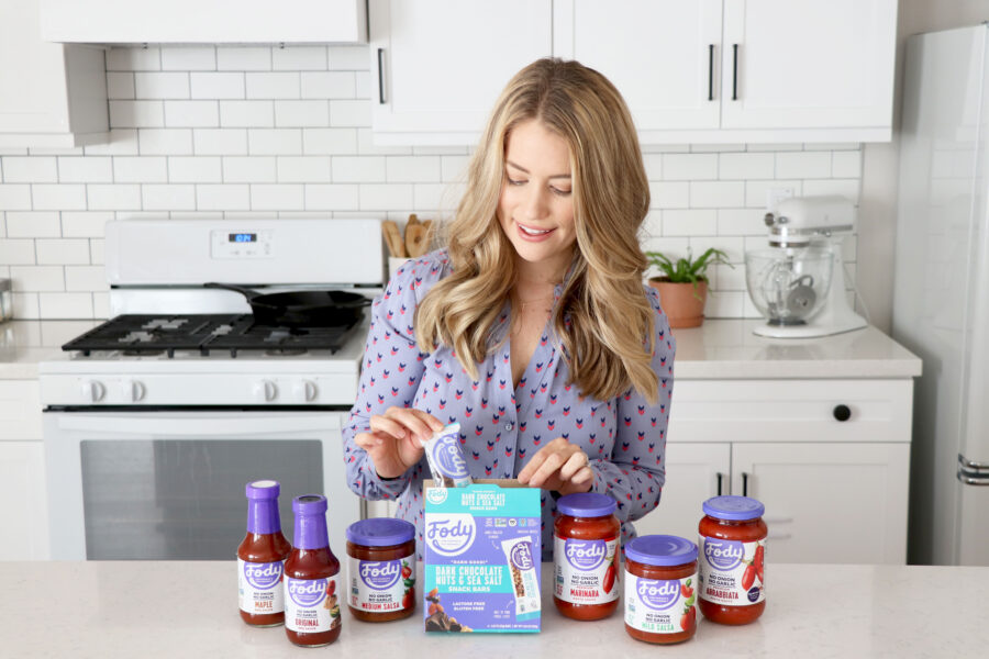 Megan showing different Fody food products.