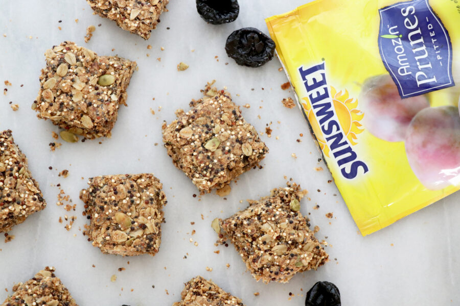 Breakfast bars on counter with Sunsweet container and prunes on the side.