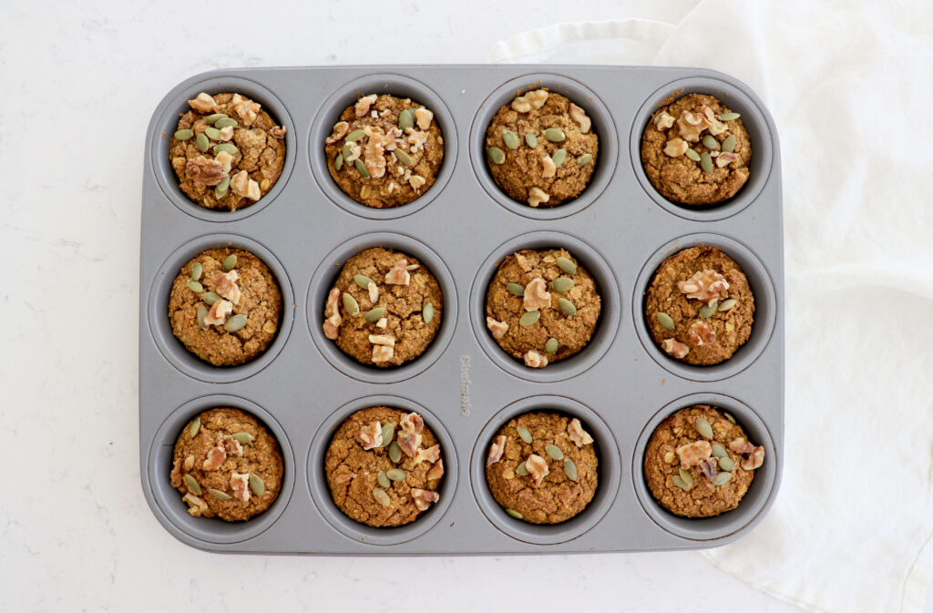 pumpkin muffins in a muffin tin