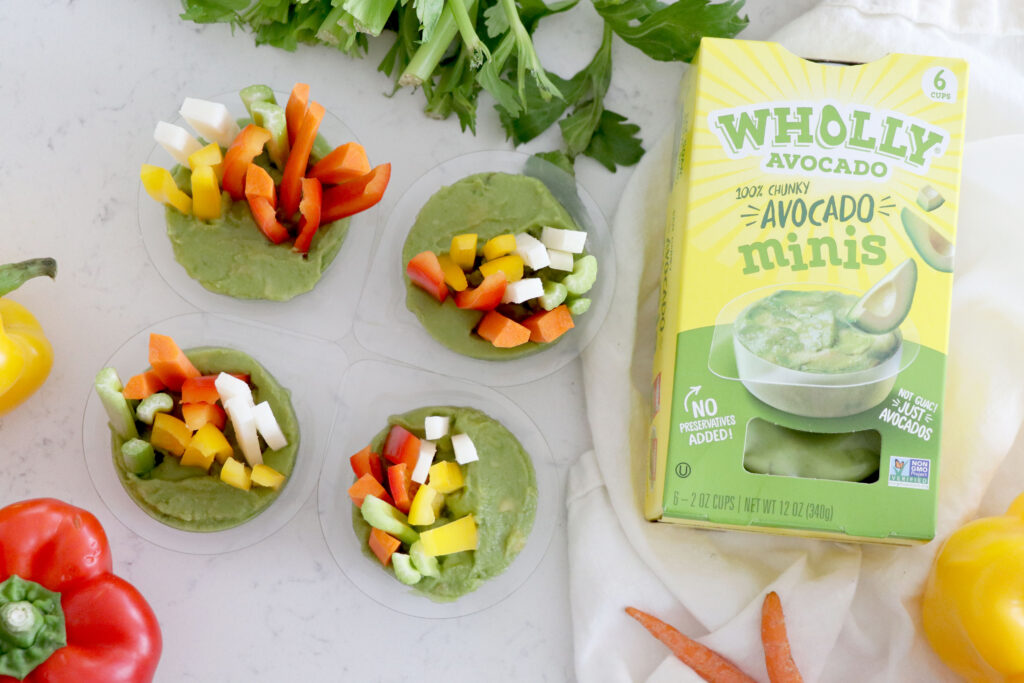 Avocado cups with sliced vegetables