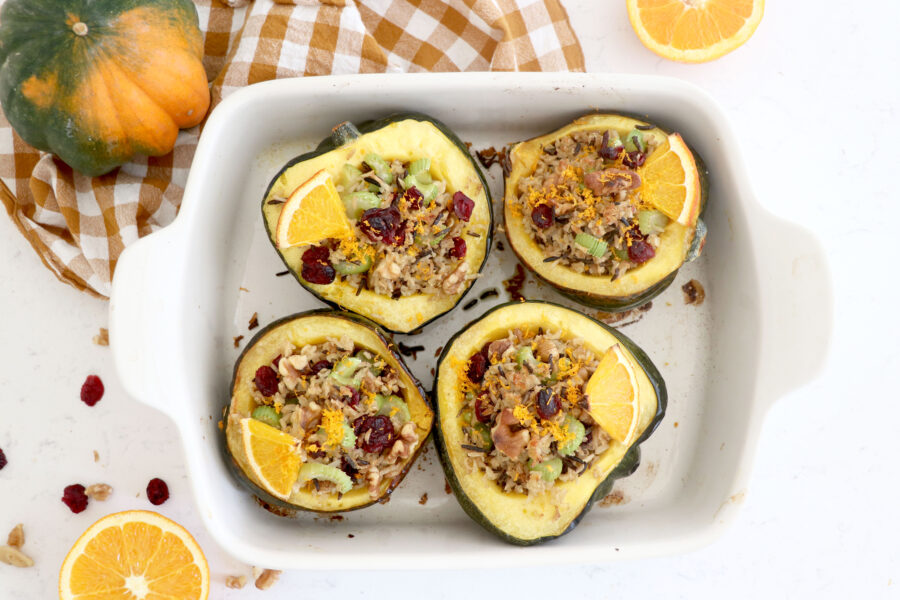 Baking dish with stuffed acorn squash.