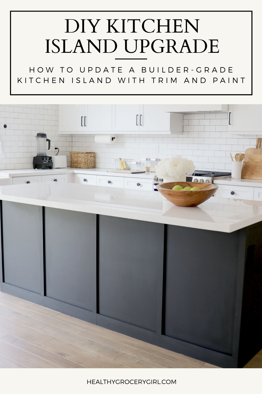 Kitchen Island with board and batten trim painted black and white quartz countertop